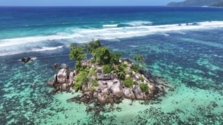 Anse Royale Beach At Mahe Island Victoria Seychelles. Turquoise Ocean Waves Gently Crashing On Tropical shore