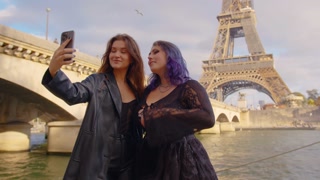 Two friends capture a moment in the world's top city. Exploring together. A couple captures a memory in Paris. Video call.